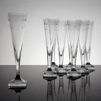 A set of 8 early 19th century champagne glasses.