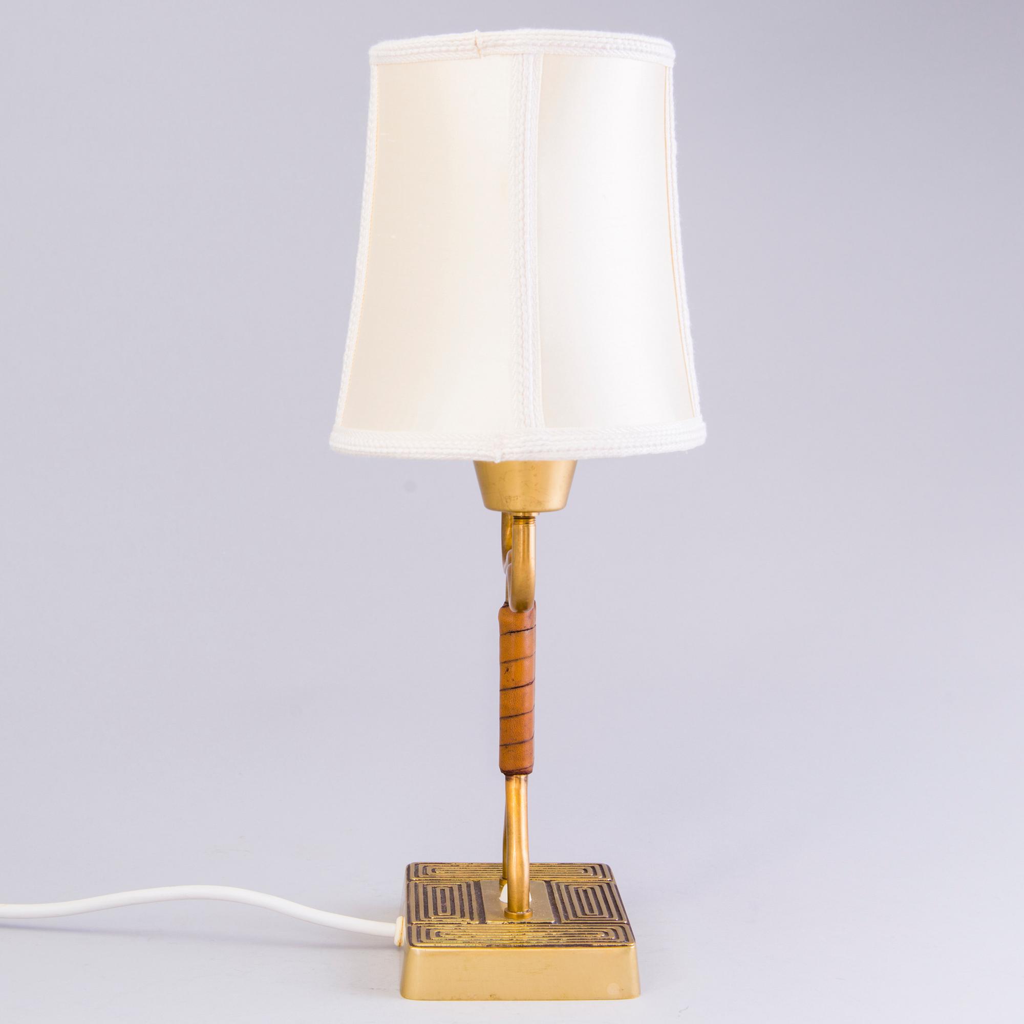 SONJA KATZIN, A 1940s brass table light from Asea, Sweden.