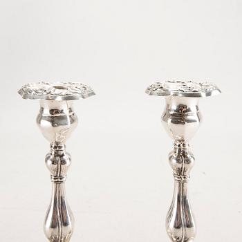 A 19th century pair of silver candle sticks mark of Oskar Närman Mariestad 1877.