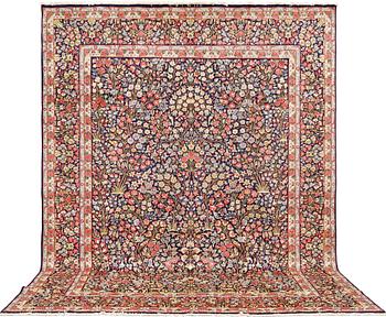 A pictoral 'Millefleur' Kerman carpet 390 x 298 cm.