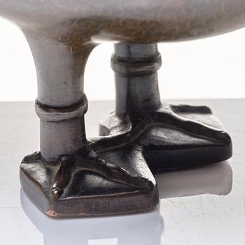 A bronze archaistic duck shaped vessel with silver inlay, Qing dynasty (1644-1912).