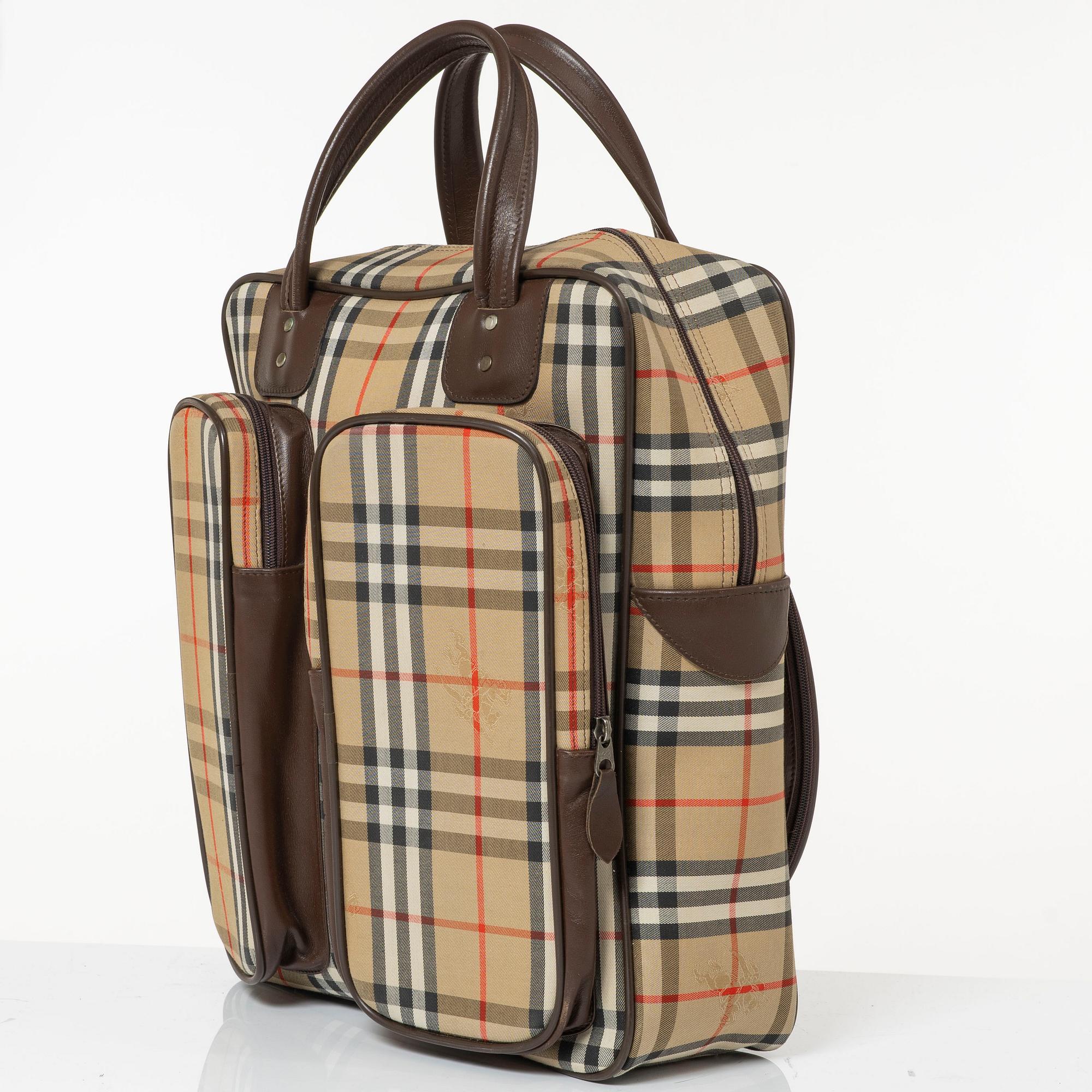 Burberry, a tennis bag.