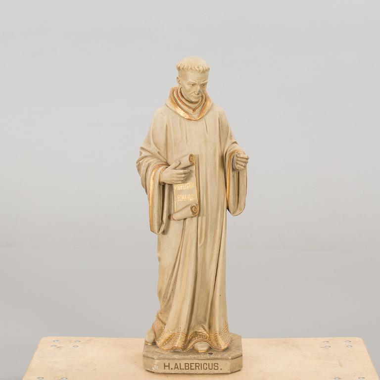 A Dutch concrete sculpture marked J van den Broeck Antwerpen 1907.