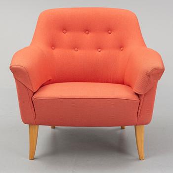 A late 20th century easy chair.