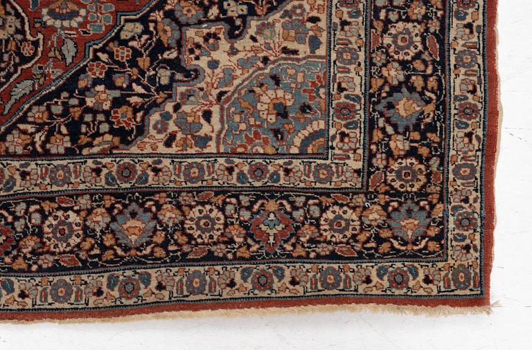 An oriental rug, c. 180 x 140 cm.