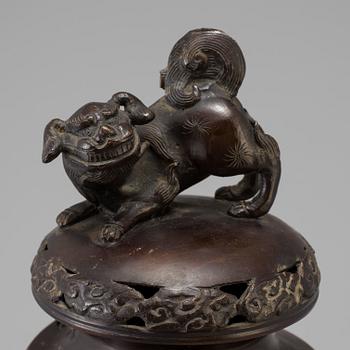 A Japanese bronze vase and cover, Meiji, late 19th century.