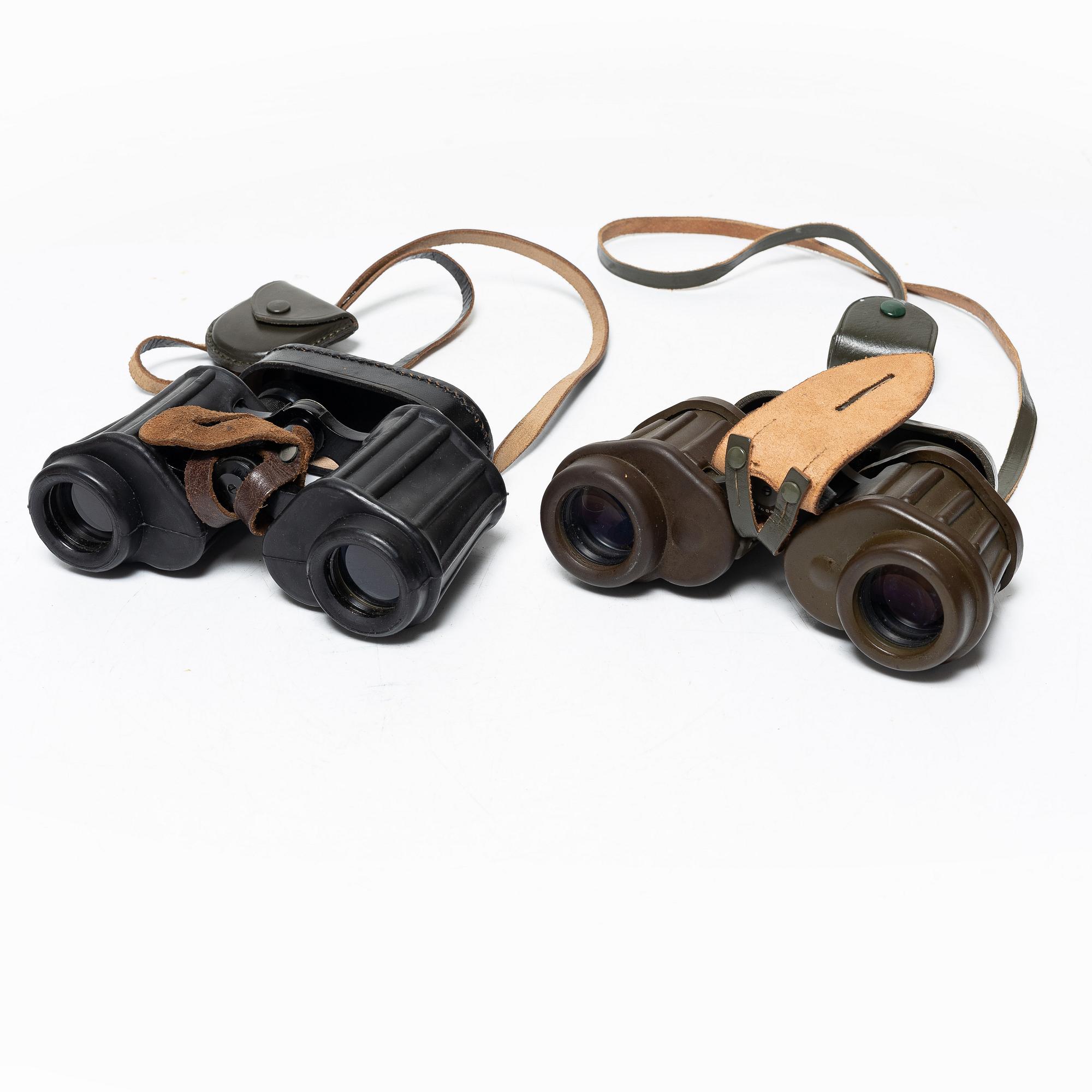 Two pairs of binoculars, Swedish Armed Forces, one marked Carl Zeiss Jena. Both with crown markings.