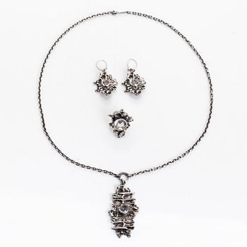 Pentti Sarpaneva, a silver and rock crystal necklace, ring and earrings, Turun Hopea, Turku.