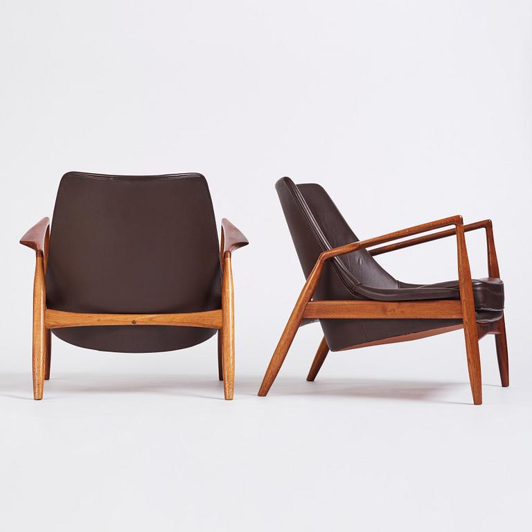 Ib Kofod-Larsen, a pair of "Sälen" dark brown leather chairs, Olof Perssons Fåtöljindustri (OPE), Jönköping.