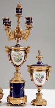 A French 'Sèvres' five piece gilt-bronze garniture, 19th Century, Signed P.D. Boucher.