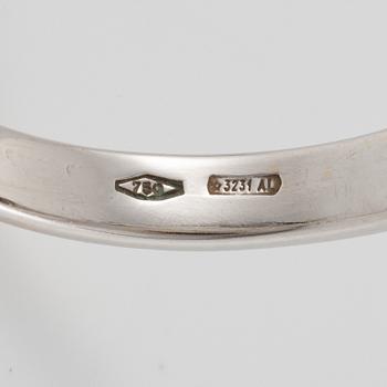 Ring 18K vitguld med briljantslipad diamant.