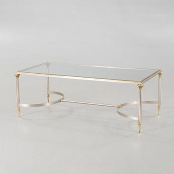 A glass and metal table, possibly Nordiska Kompaniet. 20th century.