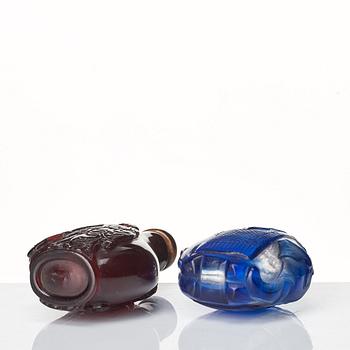 A set of two peking glass snuffbottles, late Qing dynasty.