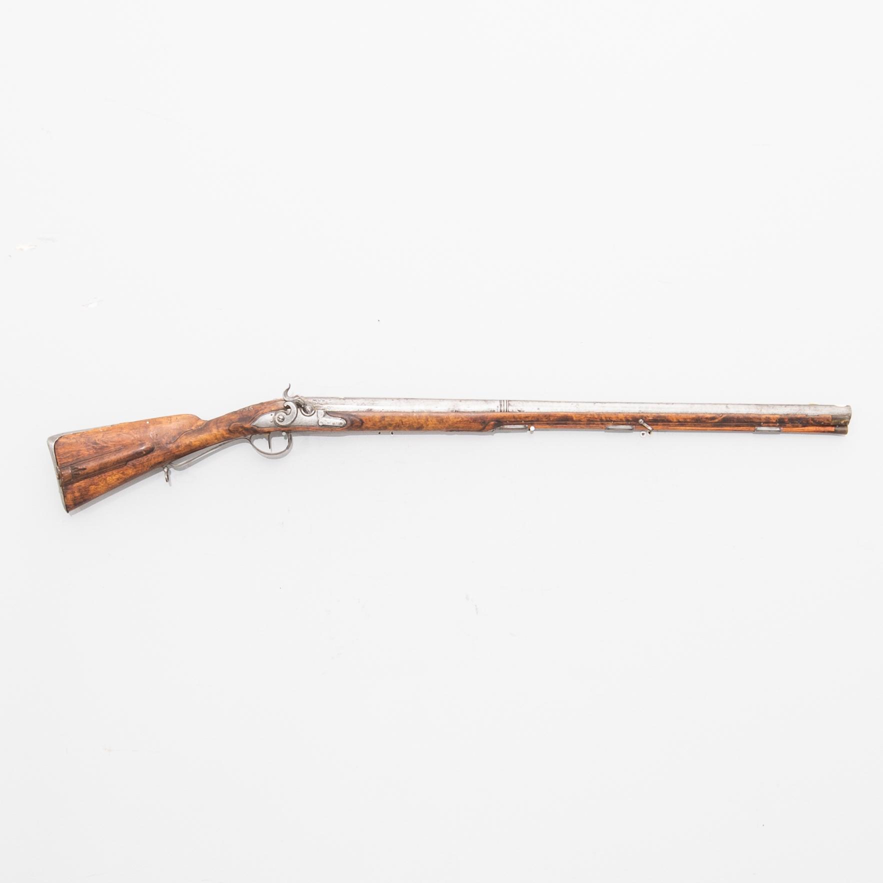 Percussion lock rifle, converted from flintlock, 18th / 19th century.