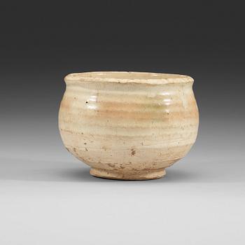 143. A white glazed pottery bowl, Tang dynasty (618-907).