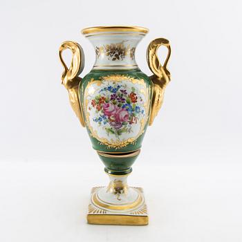 Urn in the Empire style, circa 1900, porcelain.