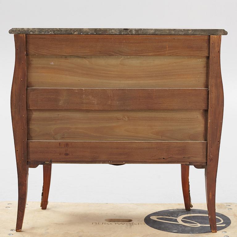 A Louis XV-style marquetry commode, first part of the 20th century.