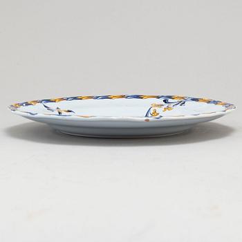 A set of four french faience cabinet plates signed Emile Gallé, Nancy. C. 1900.