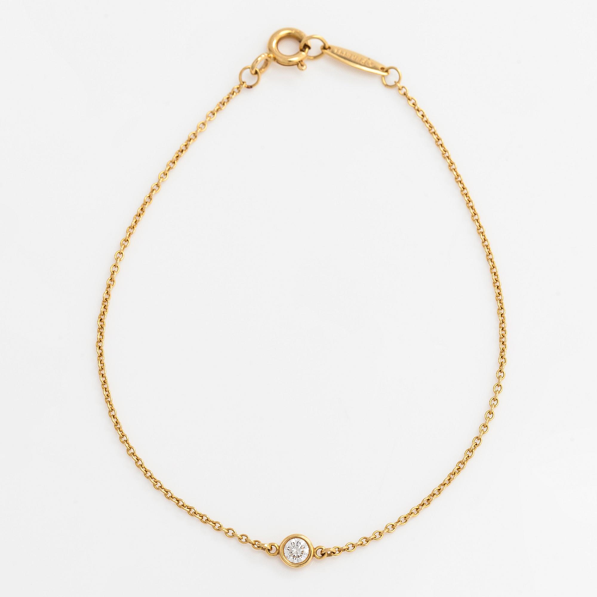 Tiffany & Co, Elsa Peretti, armband, "Diamonds by the Yard", 18K guld med en diamant ca 0.08 ct.