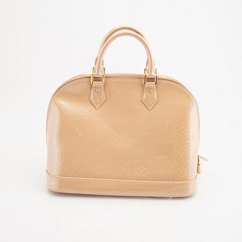 Louis Vuitton, an "Alma PM" handbag.