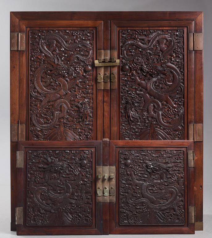 A large Imperial Hongmu compound cabinet, Qing dynasty, 19th century.