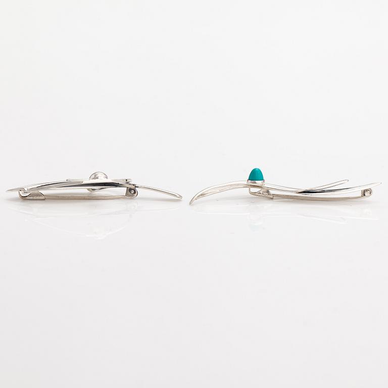 Elis Kauppi, Two silver brooches, one with a tuquoise. Kupittaan kulta, Turku 1961 and 1965.