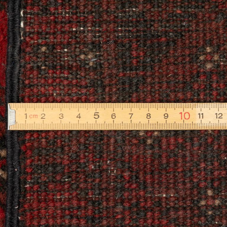 An oriental / Afghan runner, approx. 478 x 81 cm.