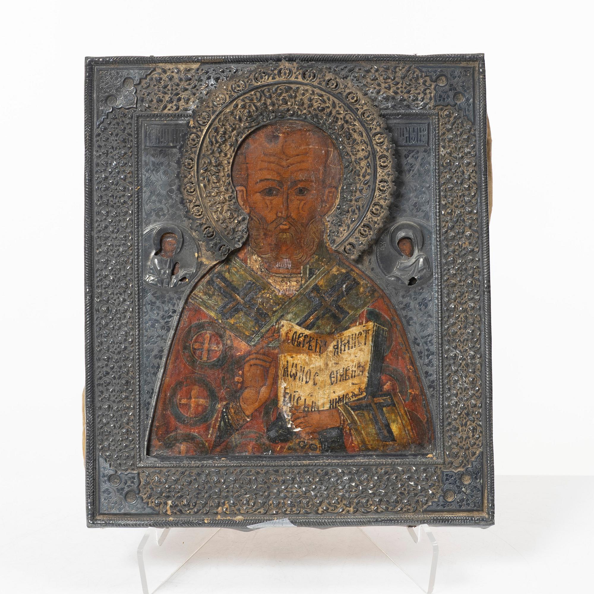 A Russian icon with silver cover, mark of assay master Ivan Yefimovich Konstantinov, Moscow 1877.