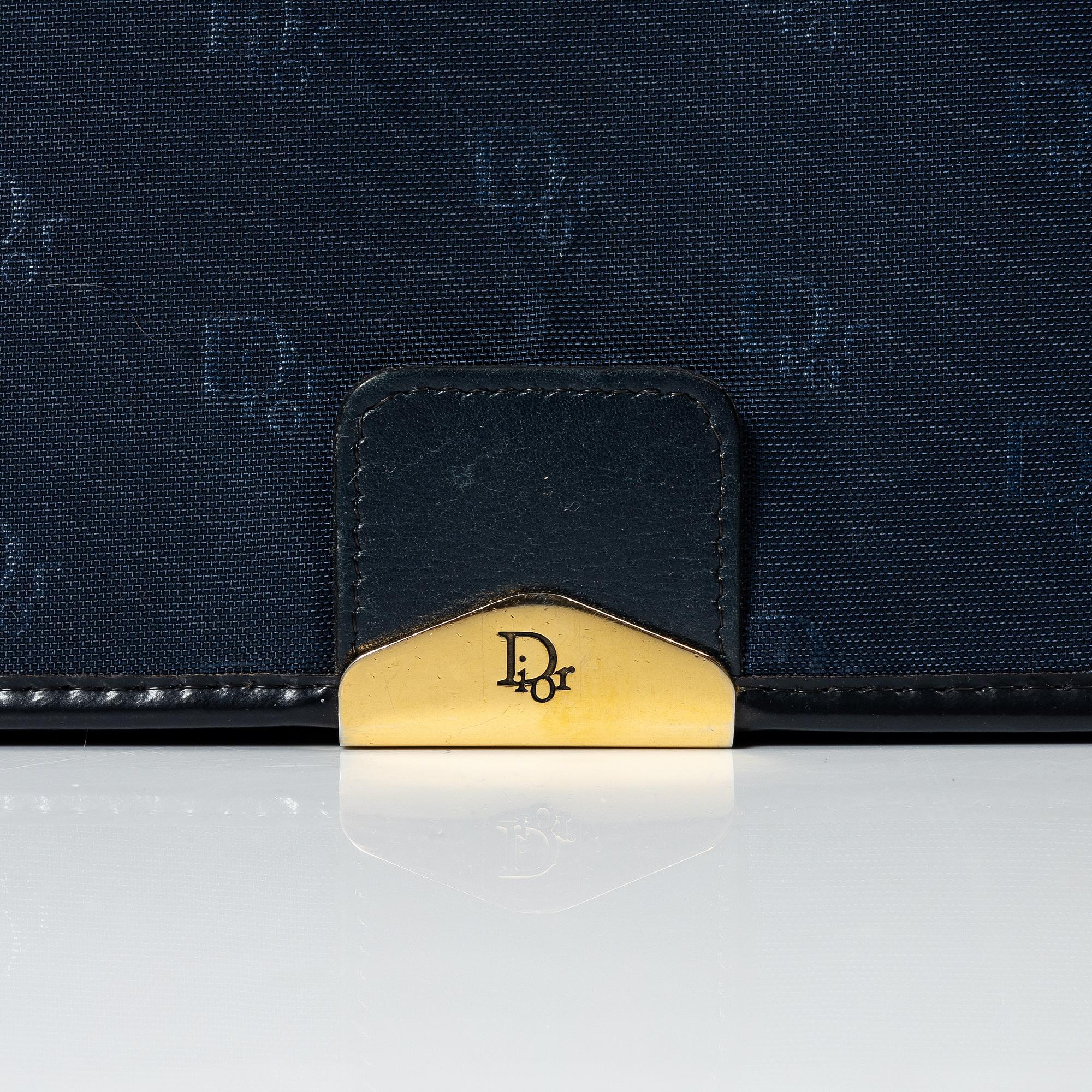 Christian Dior, aftonväska samt paraply.