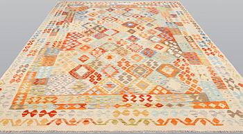 A kilim carpet, ca 350 x 258 cm.