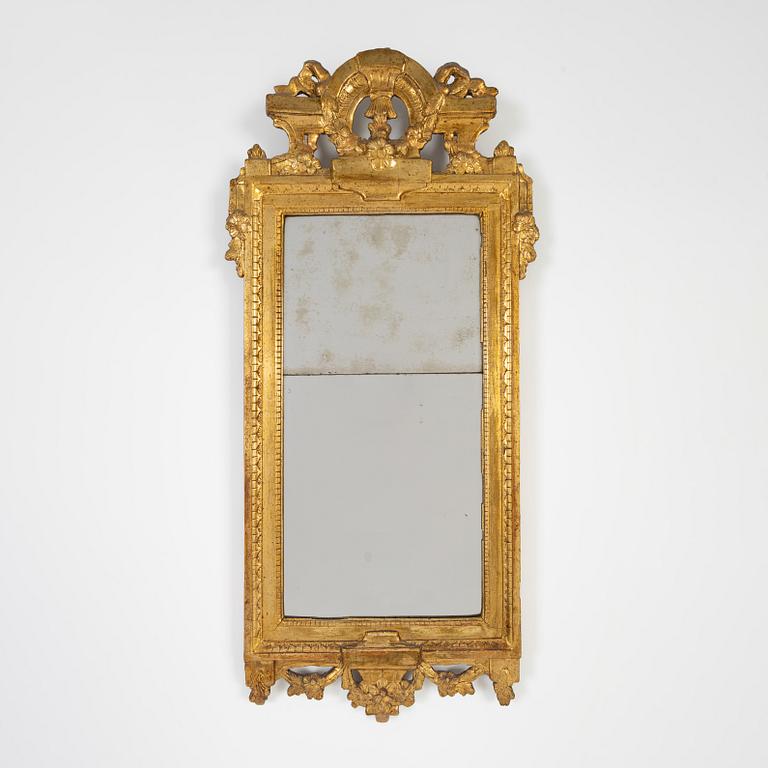 A Gustavian mirror by Johan Åkerblad, master in Stockholm 1758-99), signed.