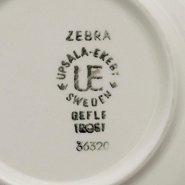 EUGEN TROST, 8 kaffekoppar med 9 fat, flintgods, "Zebra", Gefle. I produktion 1955-1967.