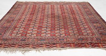 An antique Tekke, around 1890, c. 377 x 309 cm.