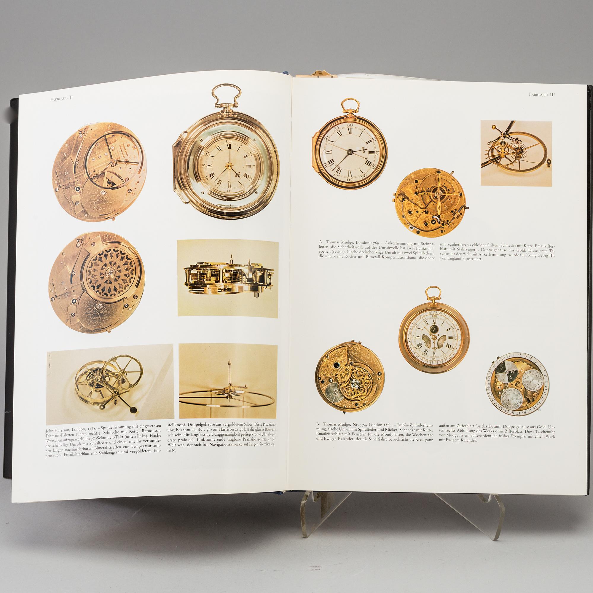 A set of 5 watch books.