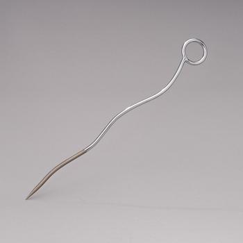 A pair of Chab Wellington coat hooks, a Smoki Christiani cork screw and a Picfeu fireplace poker. Late 1980s.
