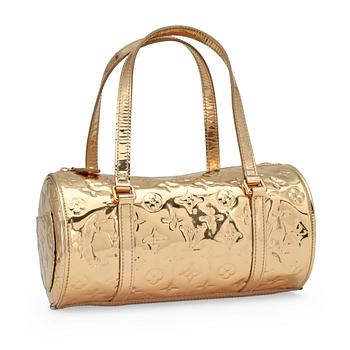 338. LOUIS VUITTON, a gold monogram "Miroir Papillon".