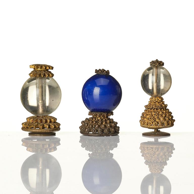 A group of 11 various 'official's hat' finials, Qing dynasty, 19th century.