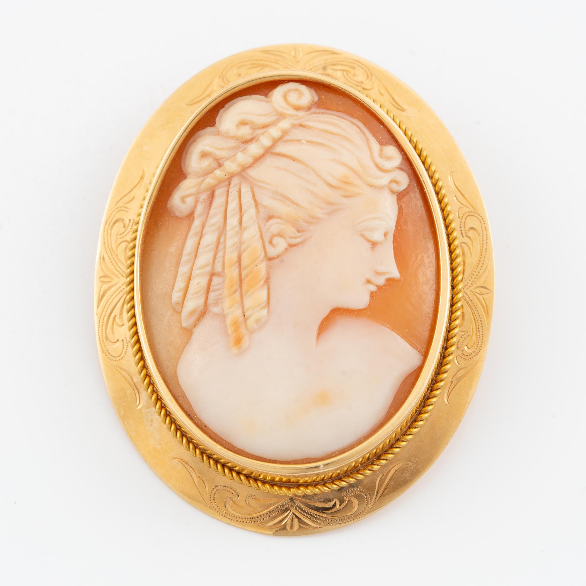 Brosch/hänge, 18K guld med snäckskalscamé.