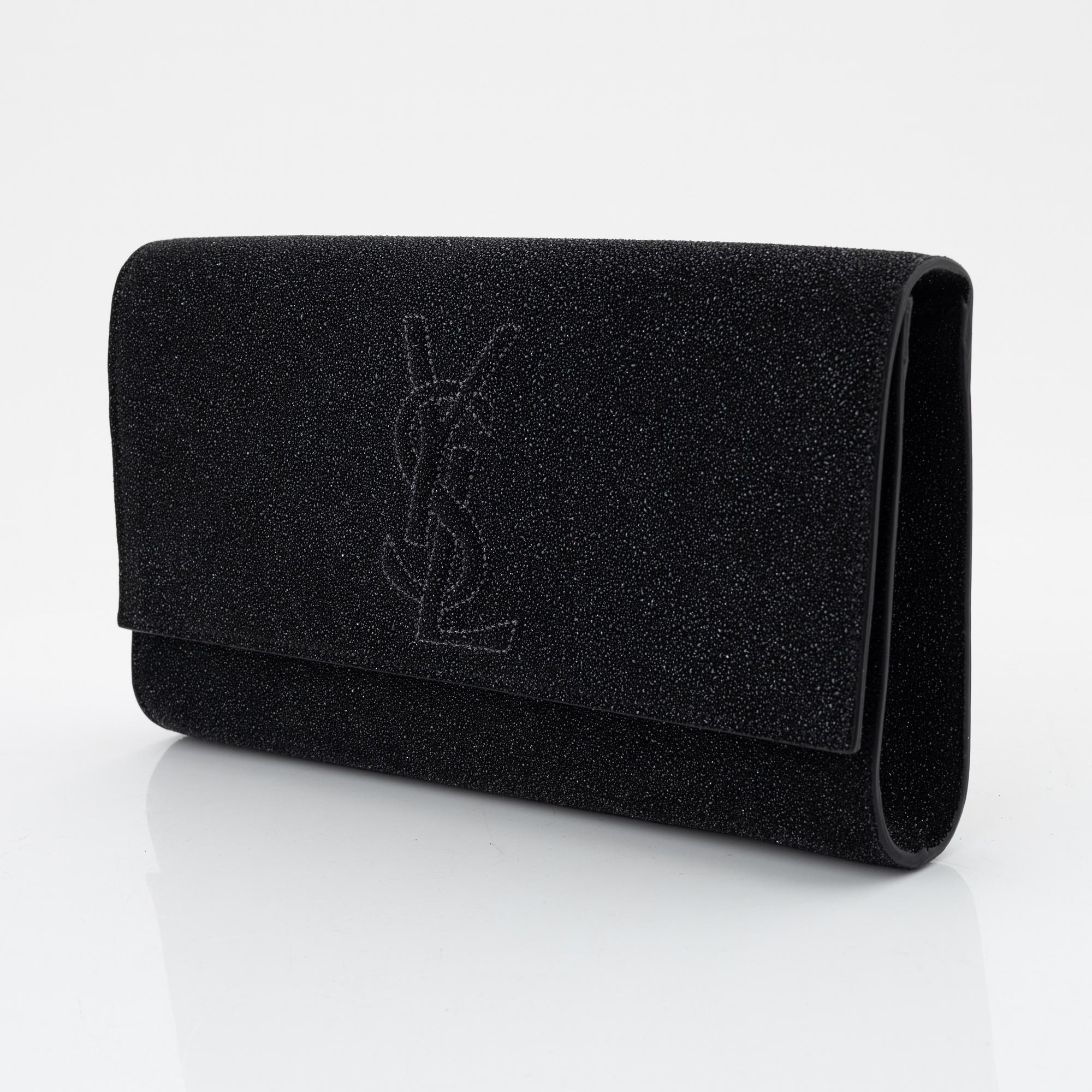 Yves Saint Laurent, a sparkly black leather clutch.