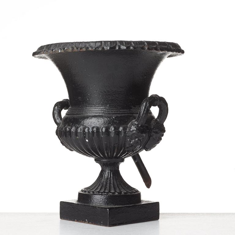 A Louis XVI-style garden urn, circa 1900.