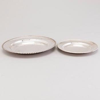 A tray and a set of 12 dishes in silver, mark of C.G. Hallberg, Stockholm 1928.