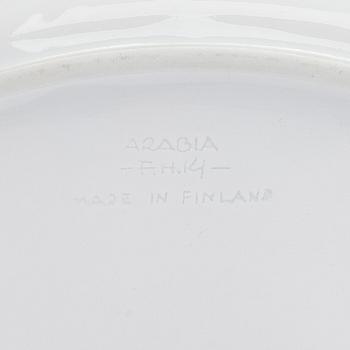 Friedl Holzer-Kjellberg, three porcelain candle holders and a "Helmi" plate, Arabia, 1970s.