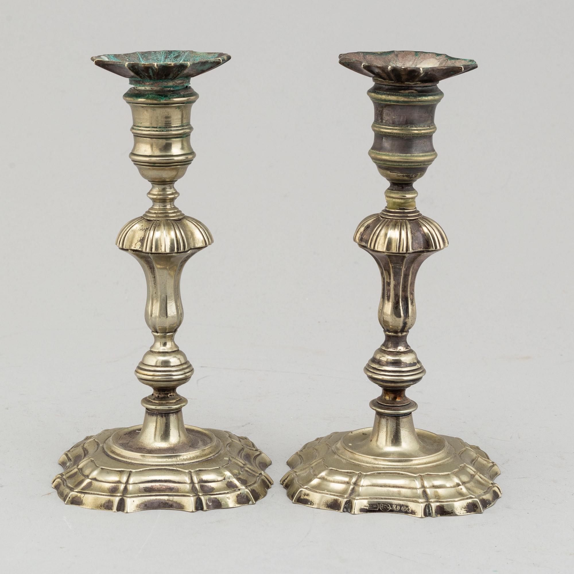 A pair of paktong candlesticks, second half of the 18th century.