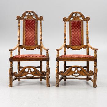 Armchairs, a pair, Baroque style 18th/19th century possibly with some earlier parts.