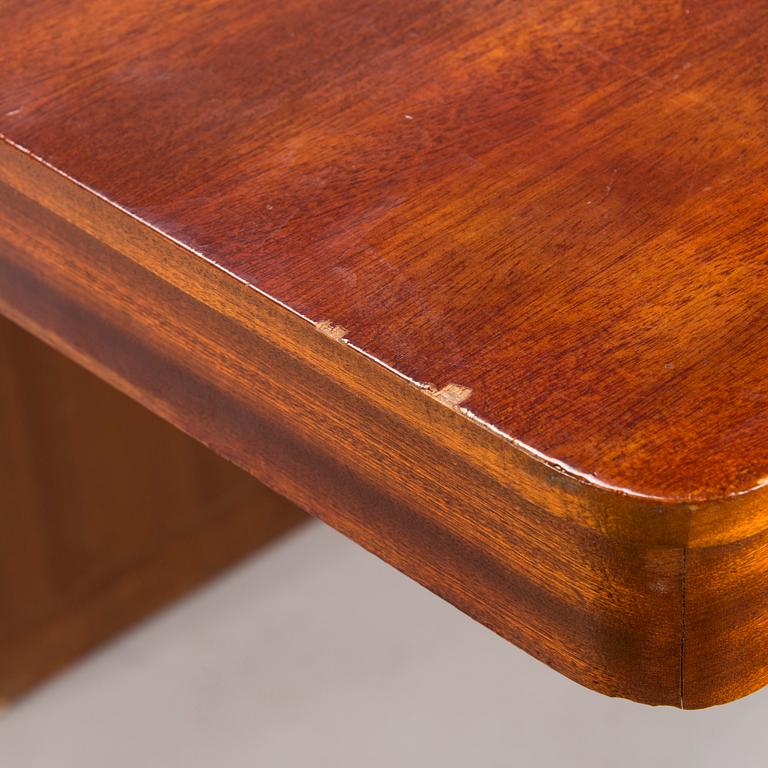 A mid 20th century conference table / dinner table marked Paul Boman.