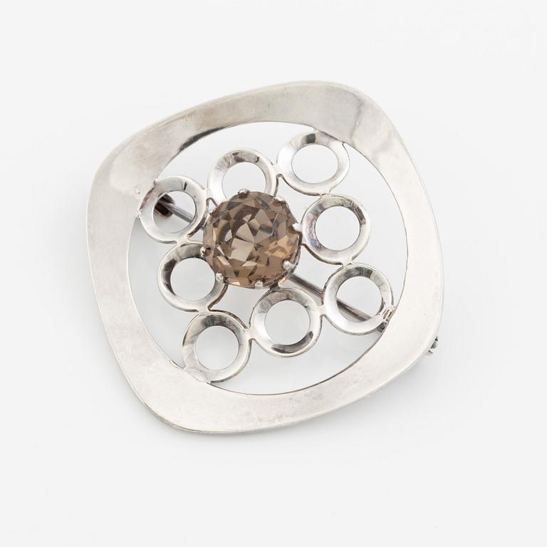 Arm ring and brooch, silver with smoky quartz, Kultasepät Salovaara.