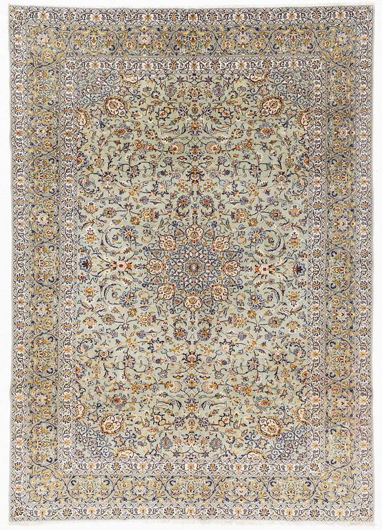 A Keshan carpet, signed, c. 410 x 297 cm.