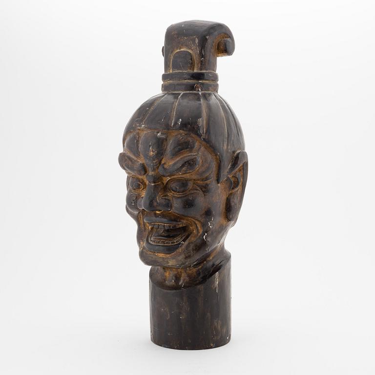 A Japanese carved wooden, lacquer and gilt head of a demon (Oni), presumably Meiji (1868-1912).