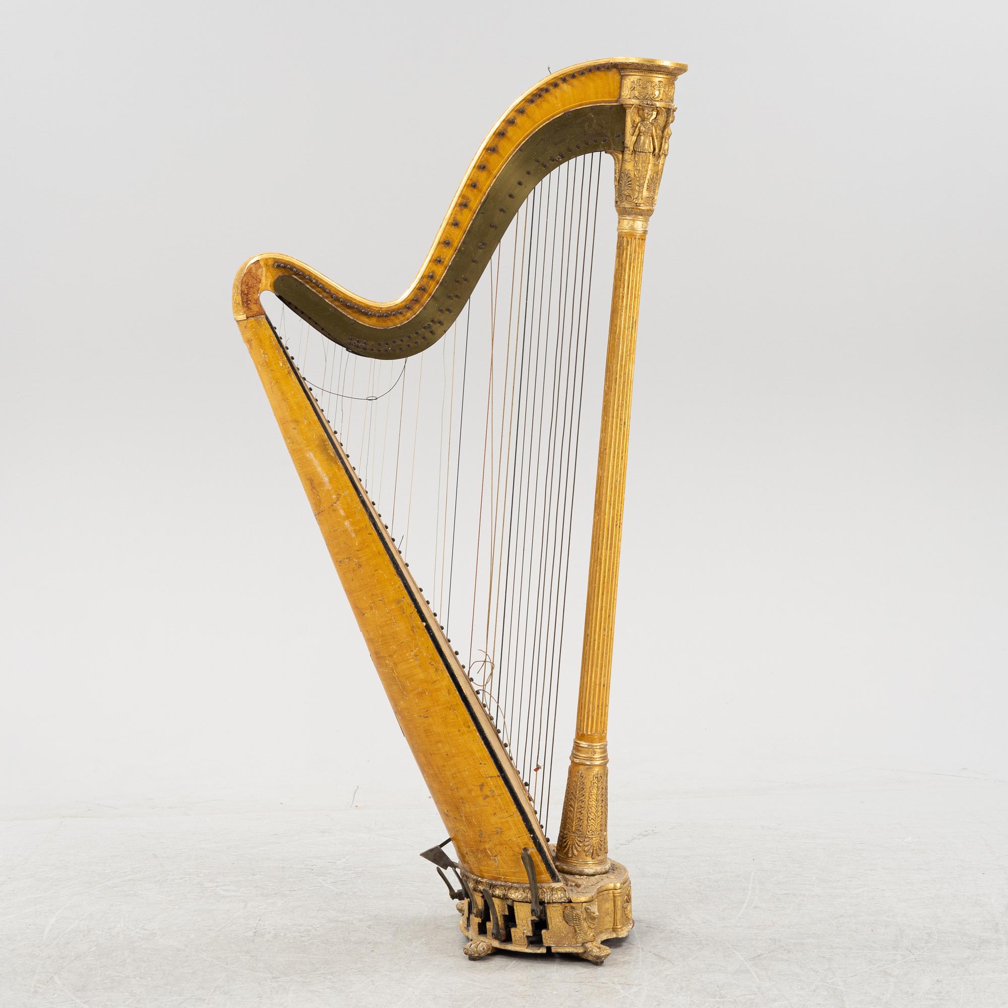 A pedal harp by Jacob & James Erat, London, No 1610, probably made between 1825-1830.