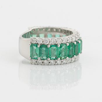 Emerald and brilliant cut diamond ring.